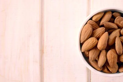Almonds in the cup Stock Photos