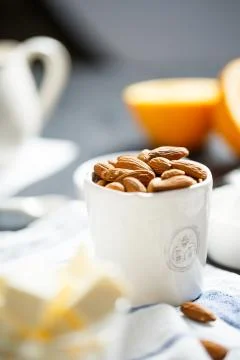 Almonds in the cup Stock Photos