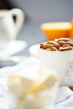 Almonds in the cup Stock Photos