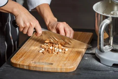 Almonds cutting knife Stock Photos
