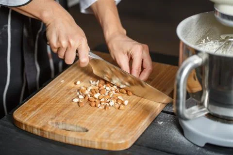 Almonds cutting knife Stock Photos