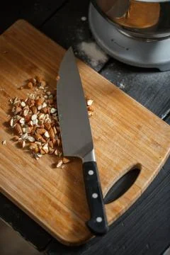 Almonds cutting knife Stock Photos