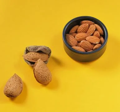 Almonds evolution from the fruit to the shelled nuts. Stock Photos