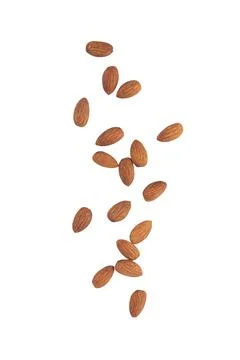 Almonds falling isolated on white background with clipping path Stock Photos