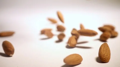 Almonds falling in slow motion Video stock 76564180