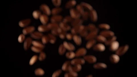Almonds fly up and down on a black background.Cooking healthy food with almonds. Stock Footage 126699640