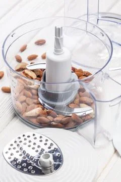 Almonds in a food processor ready to be crushed Stock Photos