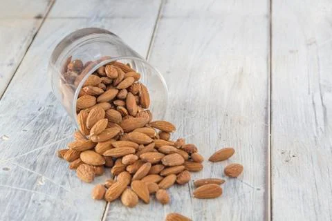 Almonds in a glass Stock Photos