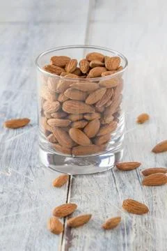 Almonds in a glass Stock Photos
