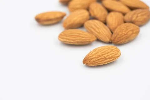 Almonds group on white background Foto stock