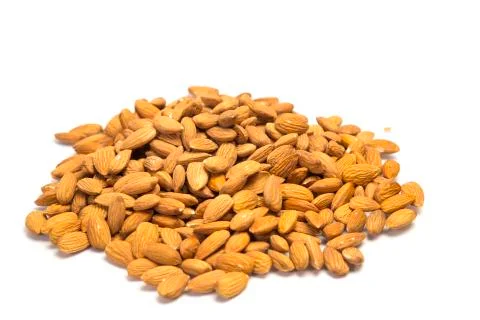 Almonds heap isolated Stock Photos