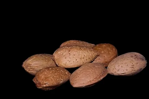 Almonds isolated on a black Stock Photos