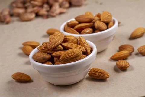 Almonds isolated on light background. Flat lay Foto stock