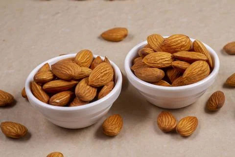 Almonds isolated on light background. Flat lay Foto stock