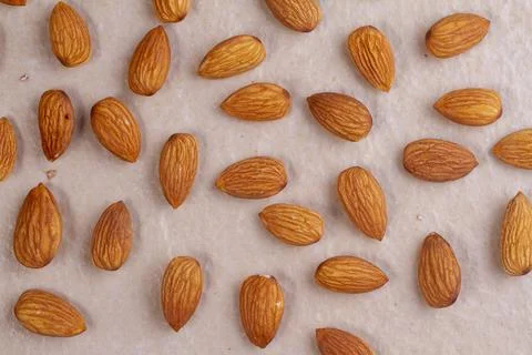 Almonds isolated on light background. Top view. Flat lay Stock Photos