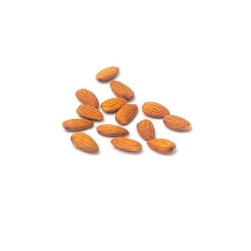 Almonds isolated on white background. Selective focused. Stock Photos