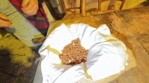 Almonds in a plate Stockbeeldmateriaal 297588304