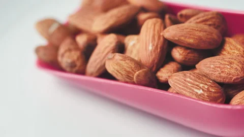 Almonds rotation on the white background - 14 Stock Footage 133632580