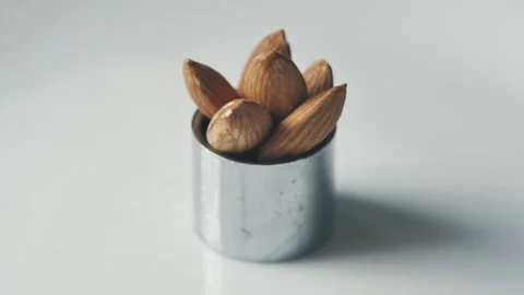 Almonds rotation on the white background - 8 Stock Footage 133632460