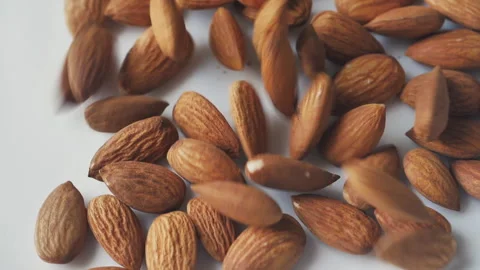 Almonds rotation on the white background - falling -6 Stock Footage 133632448