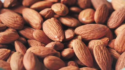Almonds rotation on the white background - falling -17 Stock Footage 133632623