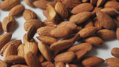 Almonds rotation on the white background - falling -1 Stock Footage 133632664