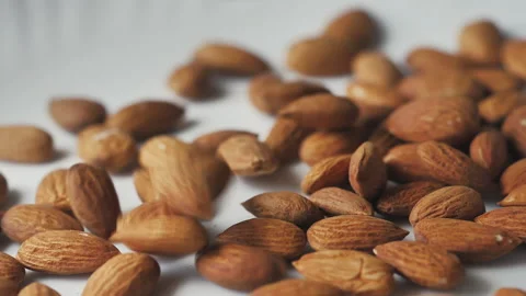Almonds rotation on the white background - falling -2 Stock Footage 133632682