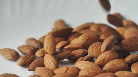 Almonds rotation on the white background - falling -3 Stock Footage 133632725
