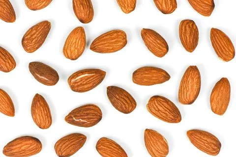 Almonds seamless texture background / Close up almond nuts natural protein fo Stock Photos