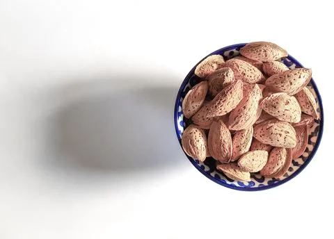 Almonds snack on white background Stock Photos