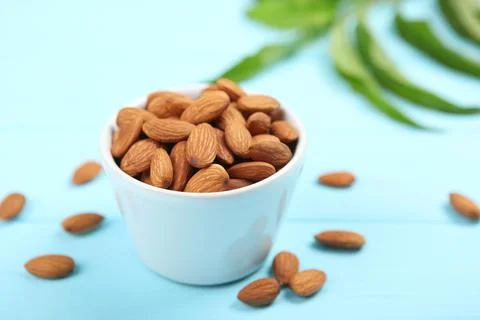 Almonds on the table close-up Stock Photos