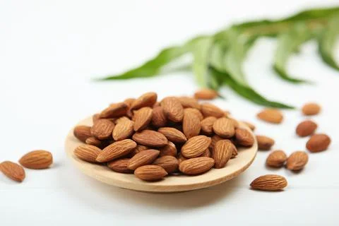 Almonds on the table close-up Stock Photos