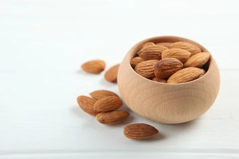 Almonds on the table close-up Stock Photos