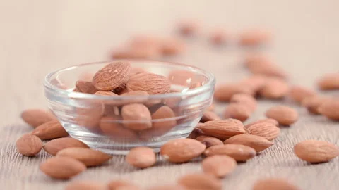 Almonds on a table 動画素材 249885437
