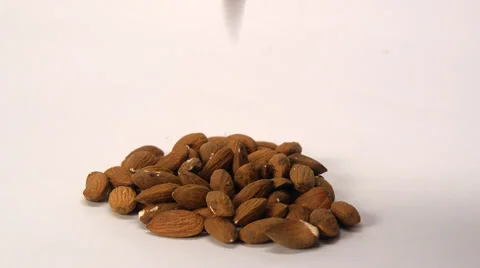 Almonds on a White Backdrop Video stock 32420803