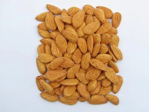 Almonds on white background close-up view  Stock-Fotos
