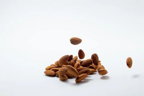 Almonds on a white background. Isolated almonds.  Stock Photos