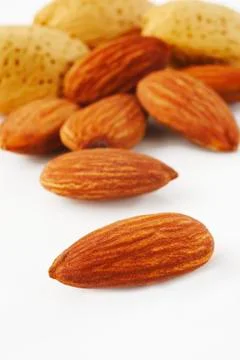 Almonds on white background Stock Photos