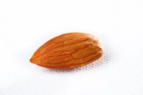 Almonds on a white background Stock Photos