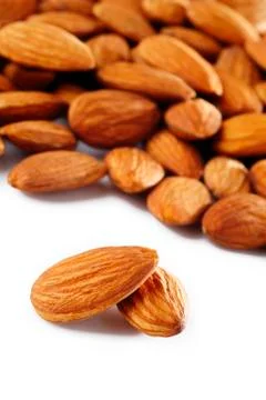 Almonds on white background Stock Photos