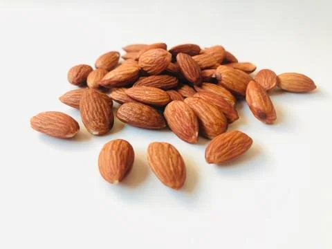 Almonds on white background Stock Photos