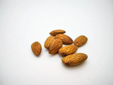 Almonds in white background. Fotos de archivo