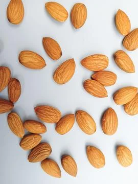 Almonds on white background  Stock Photos