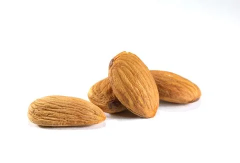 Almonds on white Stock Photos