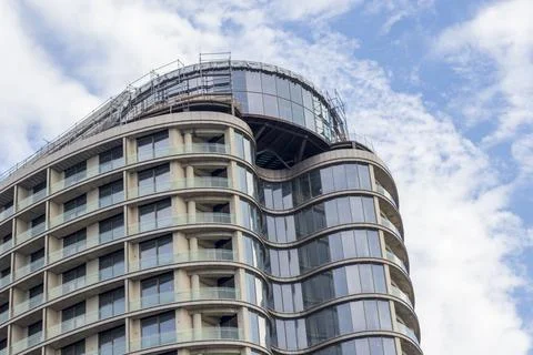 Almost completed modern building under construction. Industrial Fotos de archivo