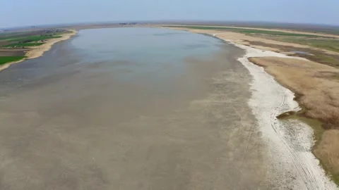Almost dried up large lake seen from air in nature reserve Slano Kopovo Stock-Footage 270501907