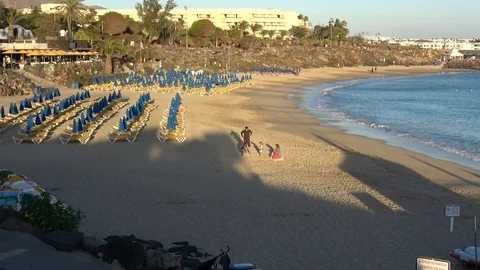 Almost empty beach in the evening in Playa Blanca Lanzarote Spain Video stock 88119806