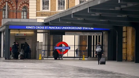 An almost empty entrance area for King's Cross St. Pancras Underground Statio Stock Footage 127383619