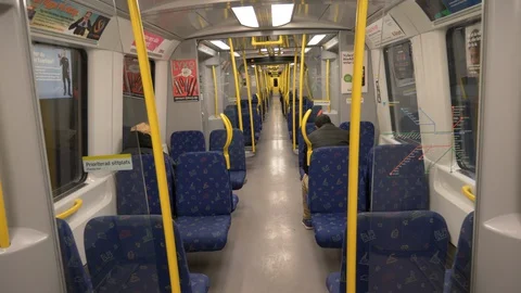 Almost empty subway train in traffic during the Covid-19 Coronavirus epidemic Stock Footage 129412779