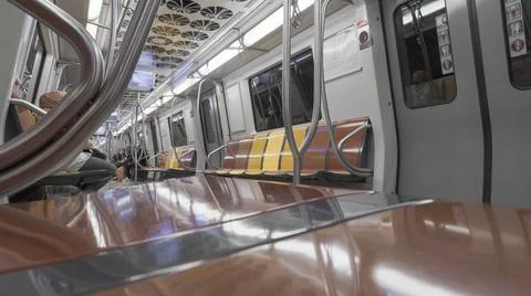 Almost empty subway view with yellow and orange colorful sits in Istanbul metro Foto stock